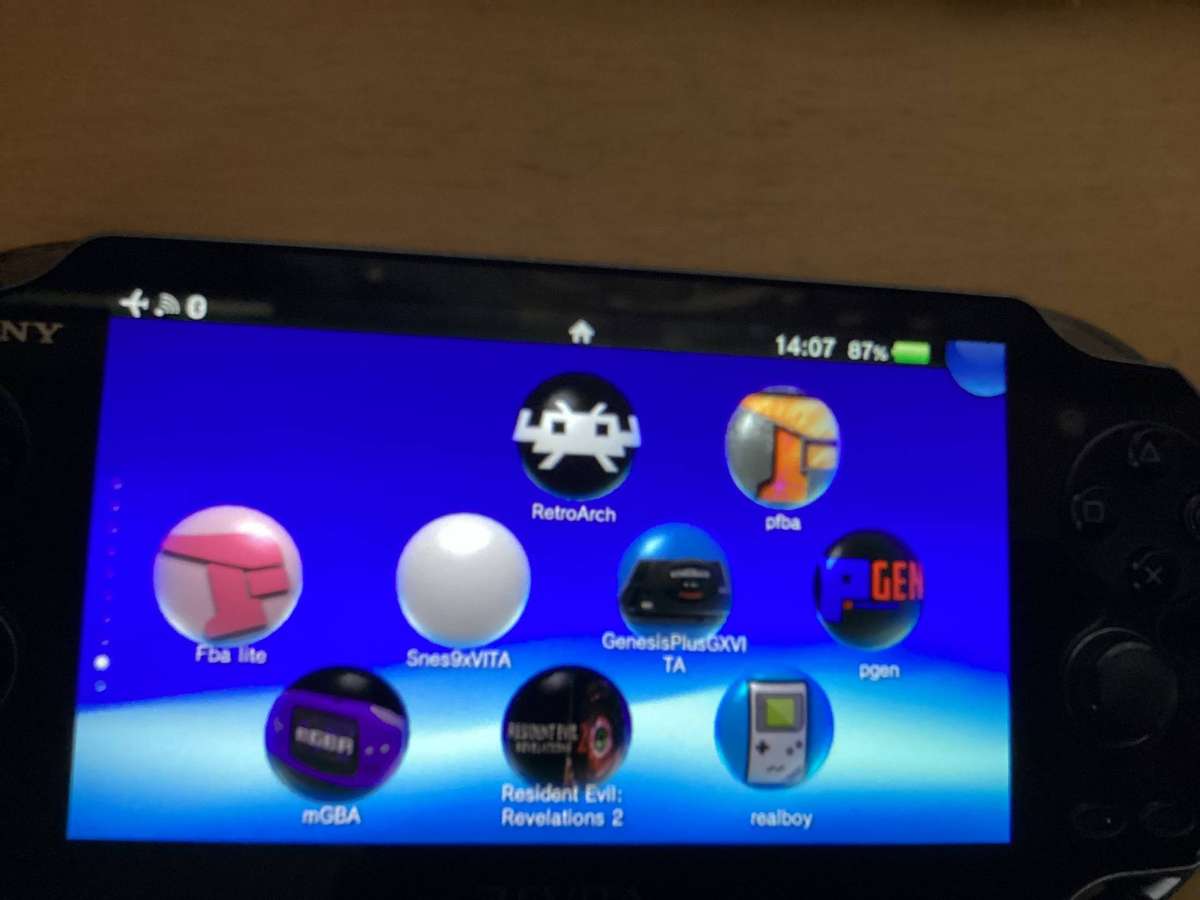PSP Vita E0682 comes with a 240 gig memory card Modded with over 50games installed
