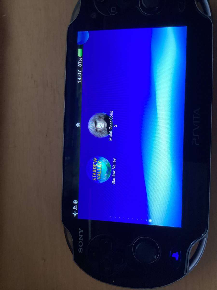 PSP Vita E0682 comes with a 240 gig memory card Modded with over 50games installed