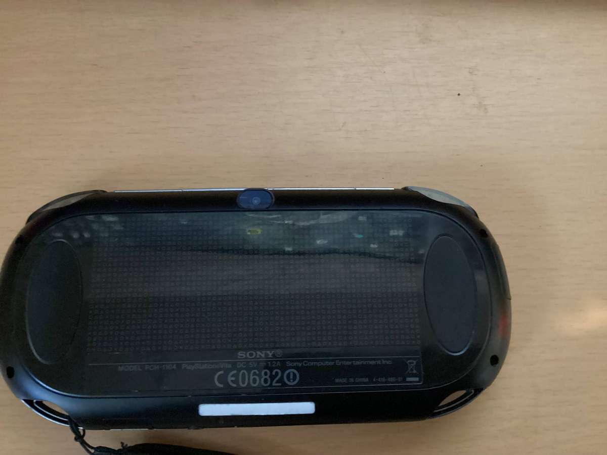 PSP Vita E0682 comes with a 240 gig memory card Modded with over 50games installed