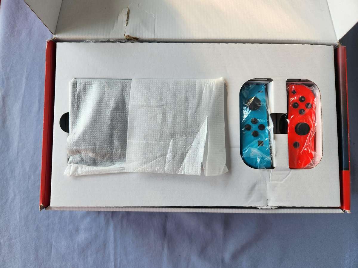 Nintendo Switch v2 Neon Blue/Neon Red - Excellent condition - Warranty + Pokemon Shield