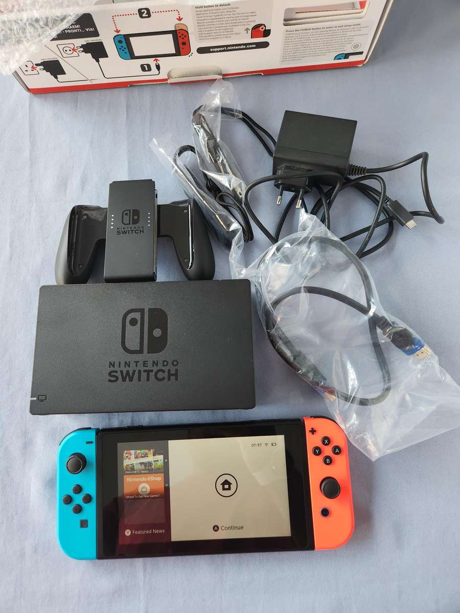 Nintendo Switch v2 Neon Blue/Neon Red - Excellent condition - Warranty + Pokemon Shield