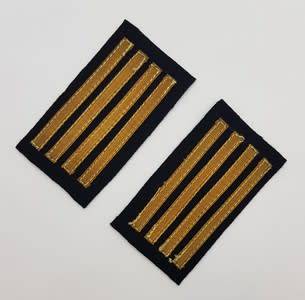 Pair of 4-stripe rank badges as per scan