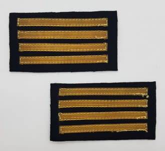 Pair of 4-stripe rank badges as per scan