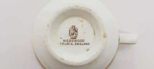 Small Wedgwood cup and saucer - some paint fade  - as per photo
