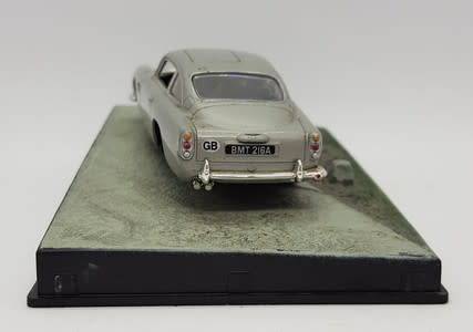 Aston Martin DB5 - Goldfinger model car  - casing cracked, broken mirror and missing light