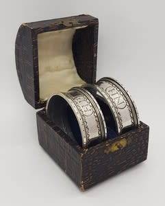 Pair of Antique Napkin Rings in original box 800 silver weight 35g as per photo