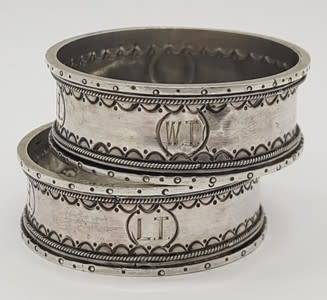 Pair of Antique Napkin Rings in original box 800 silver weight 35g as per photo
