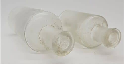 Pair of vintage perfume bottles height 13cm  and 9cm - as per photo