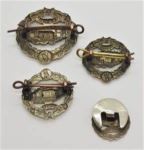 WWII Tank Corp SA Beret badge,  pair of shoulder titles and buttonhole badge - as per photo