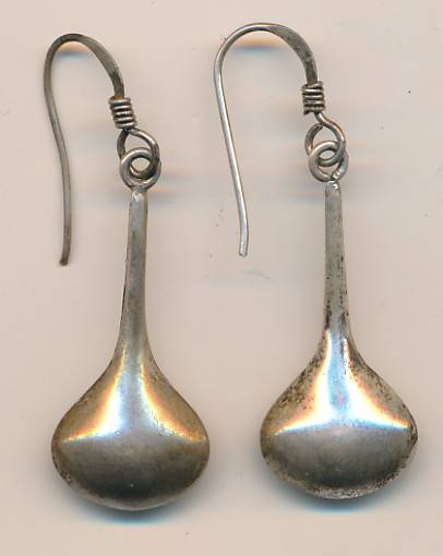 silver earrings as per scan