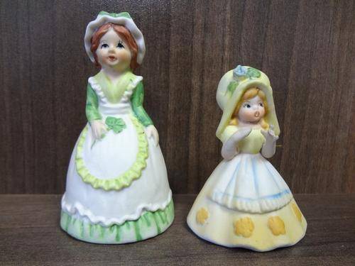 Pair of lady figurine bells - as per photo