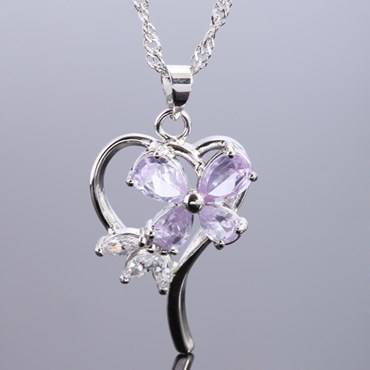 **STUNNING WHITE GOLD TANZANITE PEAR CUT PENDANT WITH CHAIN**