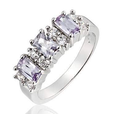 **STUNNING WHITE GOLD EMERALD CUT TANZANITE RING**