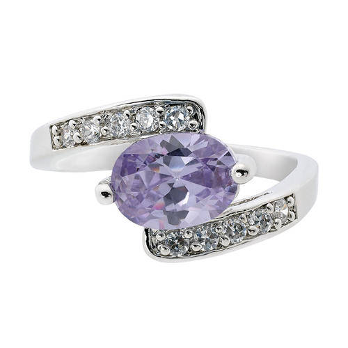 **CLASSIC WHITE GOLD OVAL CUT TANZANITE RING**