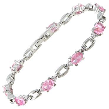 **STUNNING OVAL CUT PINK SAPPHIRE BRACELET SET IN 18CT WHITE GOLD**