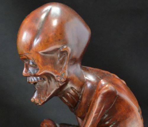 CHINESE WOOD CARVING OF A SKINNY ARHAT - from SUEZYT