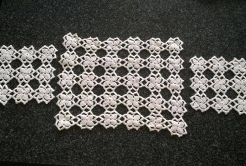 Three off-white cotton crochet doilies