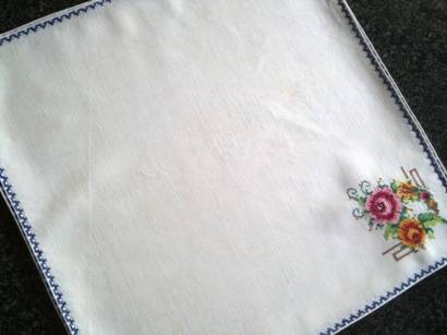 Beautiful set of eight embroidered linen dinner serviettes