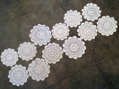 One dozen dainty crochet cotton doilies