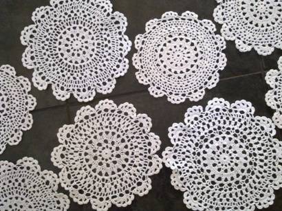 One dozen dainty crochet cotton doilies