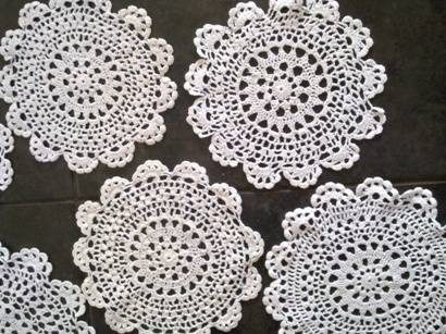 One dozen dainty crochet cotton doilies