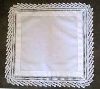 Striking antique white linen centre piece