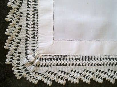 Striking antique white linen centre piece