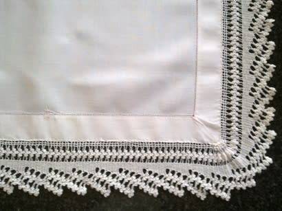 Striking antique white linen centre piece