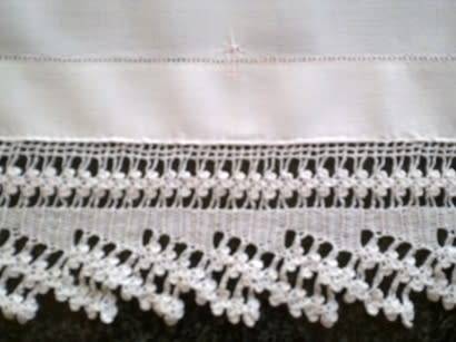 Striking antique white linen centre piece