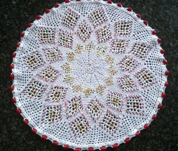 Large vintage glass beaded doilie with red and yellow seed beads