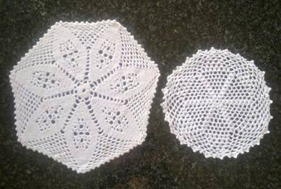 Two white crochet doilies 23cm & 17cm