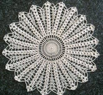Attractive cream crochet doilie 29cm