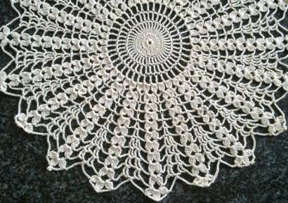 Attractive cream crochet doilie 29cm