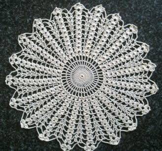 Attractive cream crochet doilie 29cm
