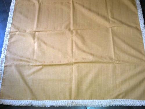 Large gold tablecloth with tassel trim
