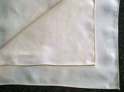 Pair of ivory Irish linen dinner serviettes