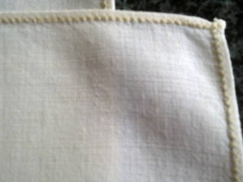 Pair of ivory Irish linen dinner serviettes