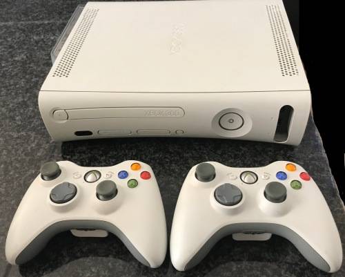 Xbox 360, 120GB HDD, in mint condition, with 2 controllers and 11 games.