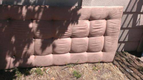 Wall-mounted padded headboard (Proceeds donated to charity)