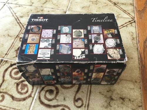 Tissot watch with box and accessories