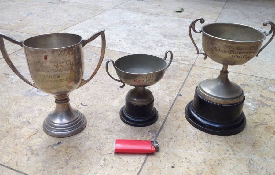 3 vintage trophies , 1948 , 1955 and 1960