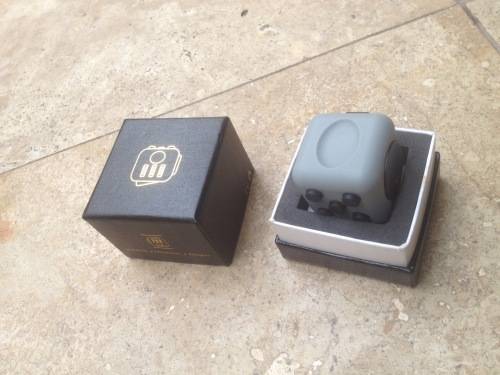 fidget stress cube toy , grey and black boxed