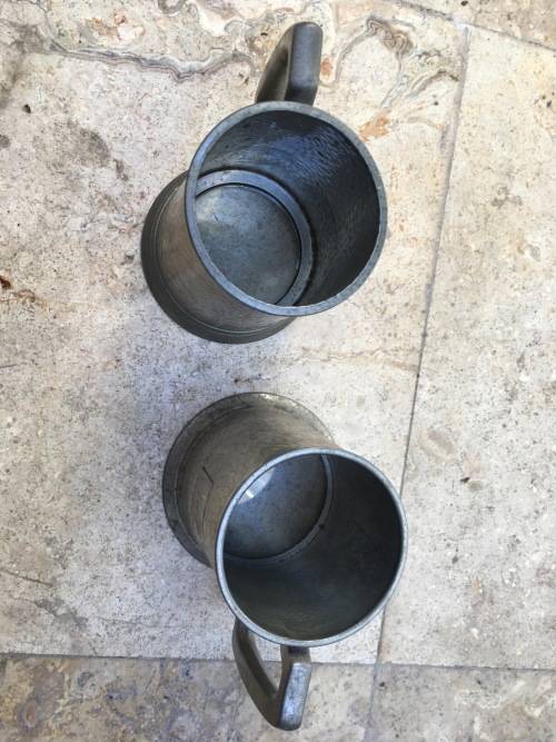 vintage pewter beer mug pair , glass bottom