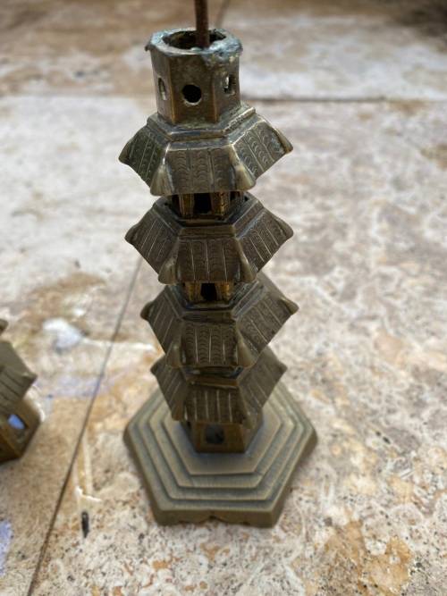 vintage brass pagoda incense holder and pagoda candle stick holder pair