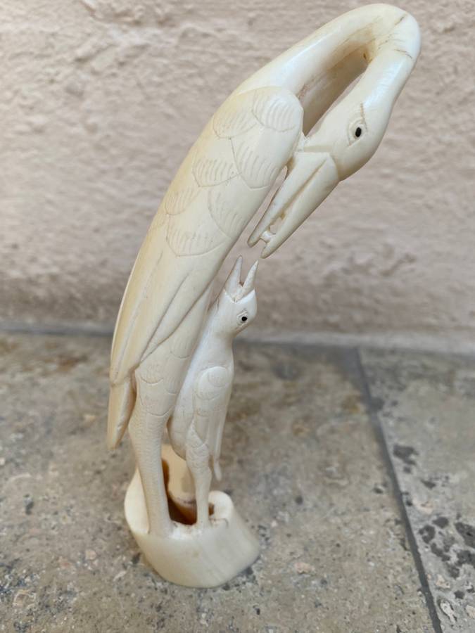 Vintage hand carved bone heron crane bird mother and baby bird feeding figurine