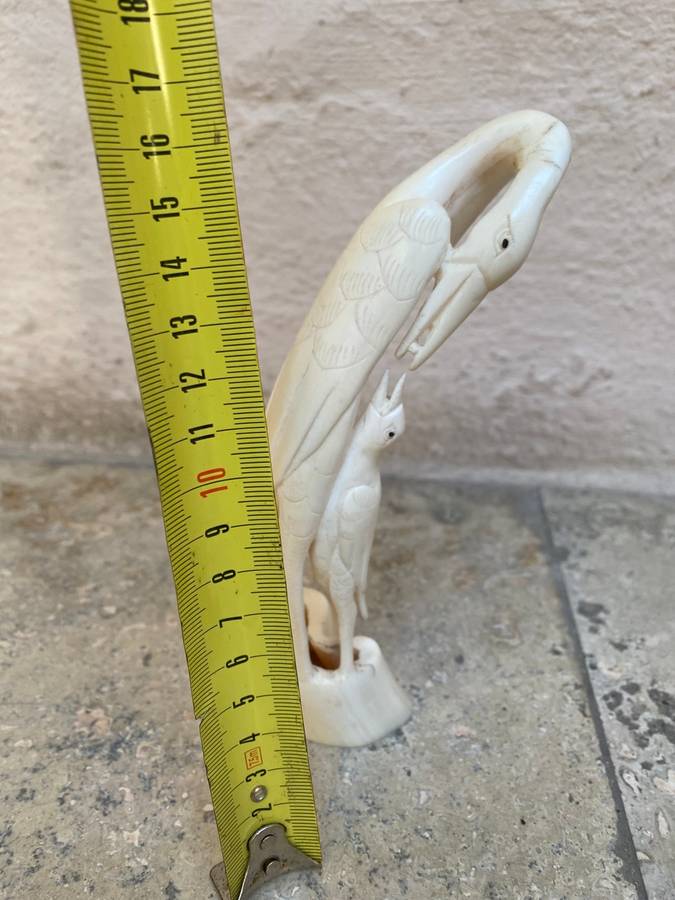 Vintage hand carved bone heron crane bird mother and baby bird feeding figurine