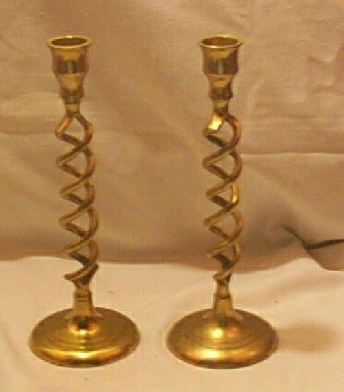 Pair of brass candlesticks, open twist stem 233mm high
