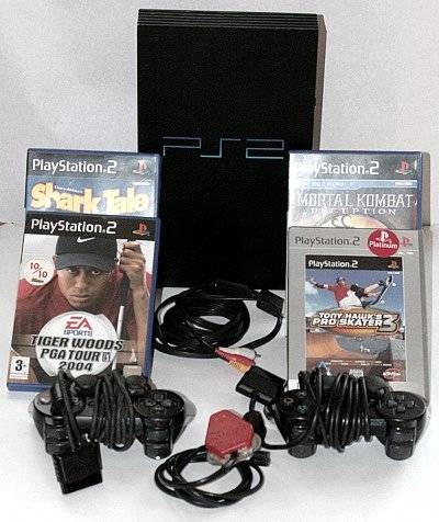 SONY PLAY STATION 2 game console with 2 Contollers and 4 GAMES