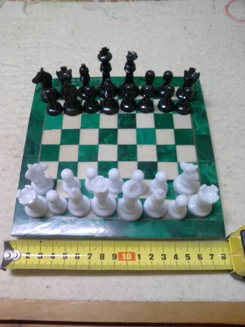 A VINTAGE MARBLE CHESS BOARD