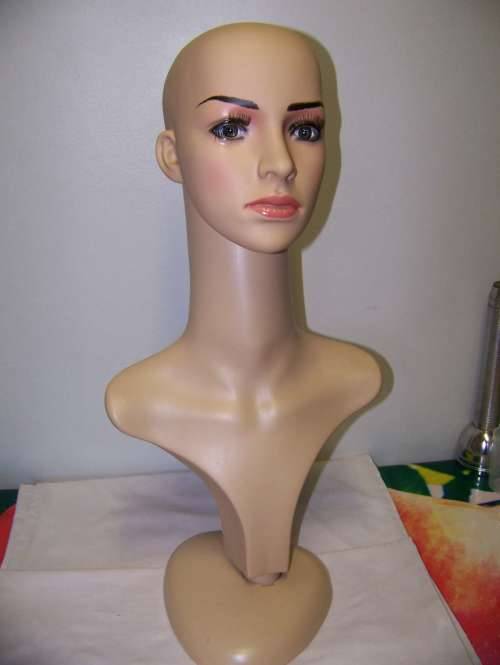 Female Mannequin head piece on bust.